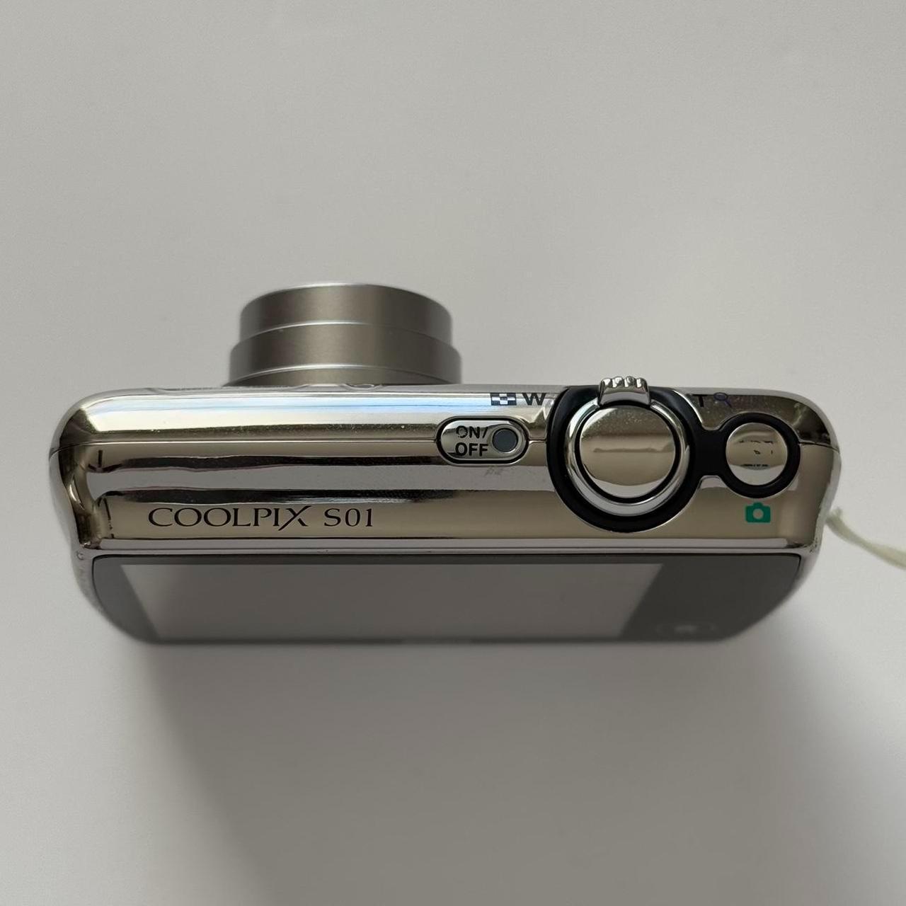 Nikon Coolpix S01 Mini Digital CameraThis ultra...