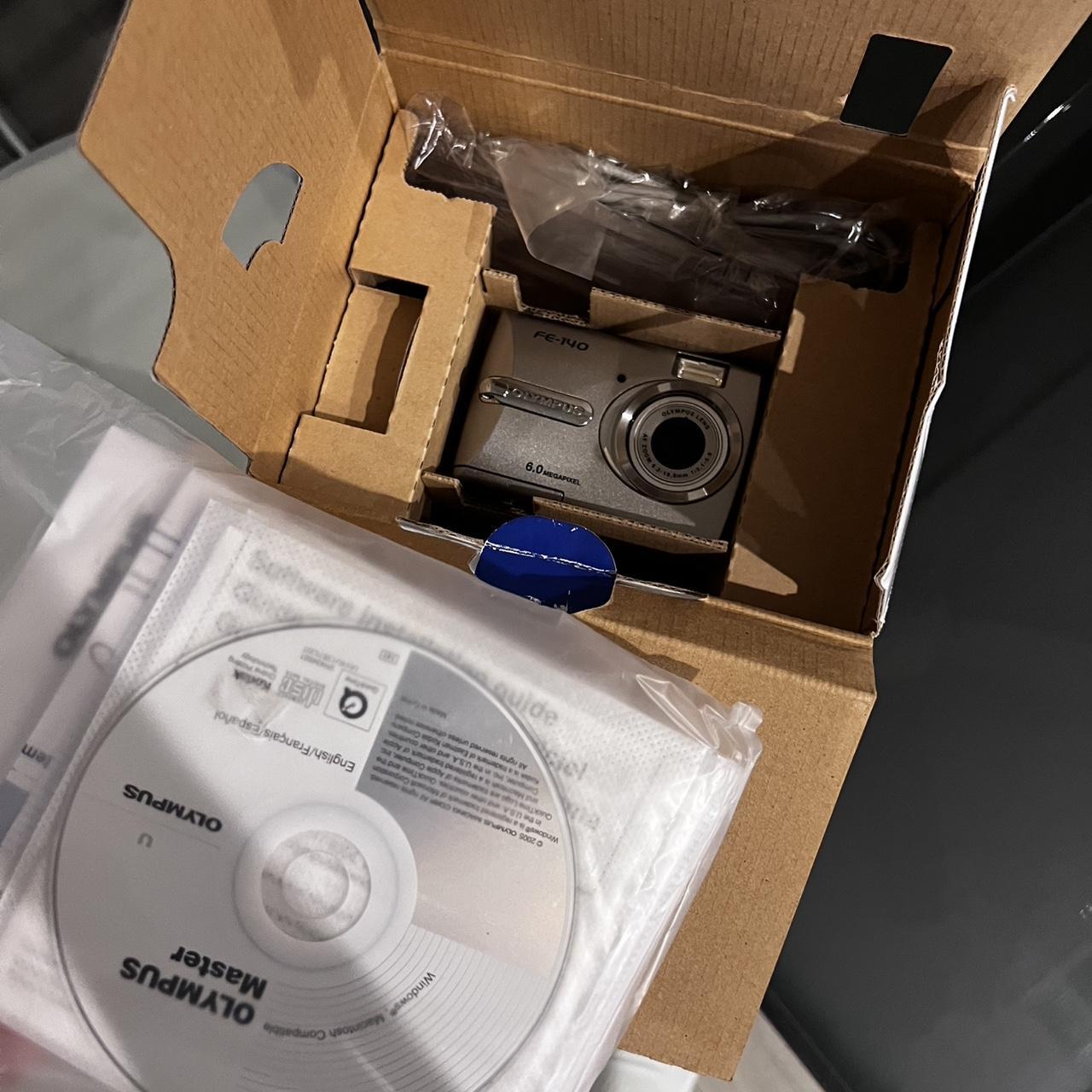 Olympus FE-140 silver digital camera brand new comes...