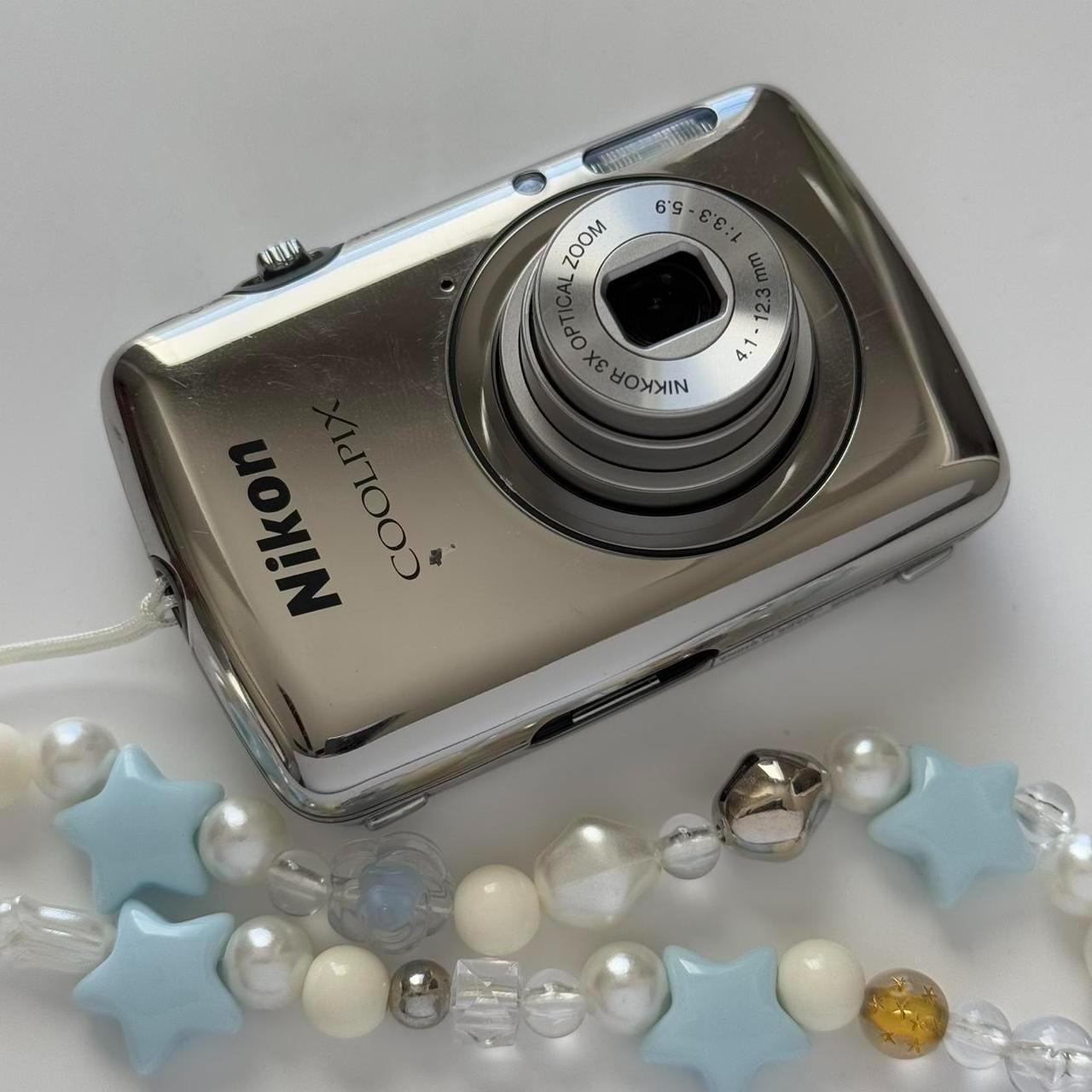 Nikon Coolpix S01 Mini Digital CameraThis ultra...