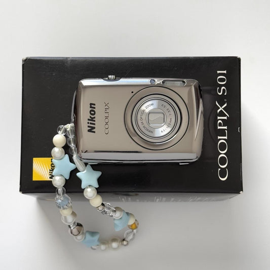 Nikon Coolpix S01 Mini Digital CameraThis ultra...